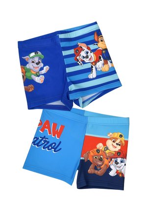 Two pairs of blue children's swim trunks with Paw Patrol cartoon dog characters and logo in bright colors.