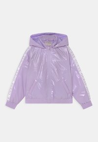 Lilac, glossy windbreaker jacket with a hood, front zip, side pockets, and white printed branding on sleeves. Elastic cuffs and hem.