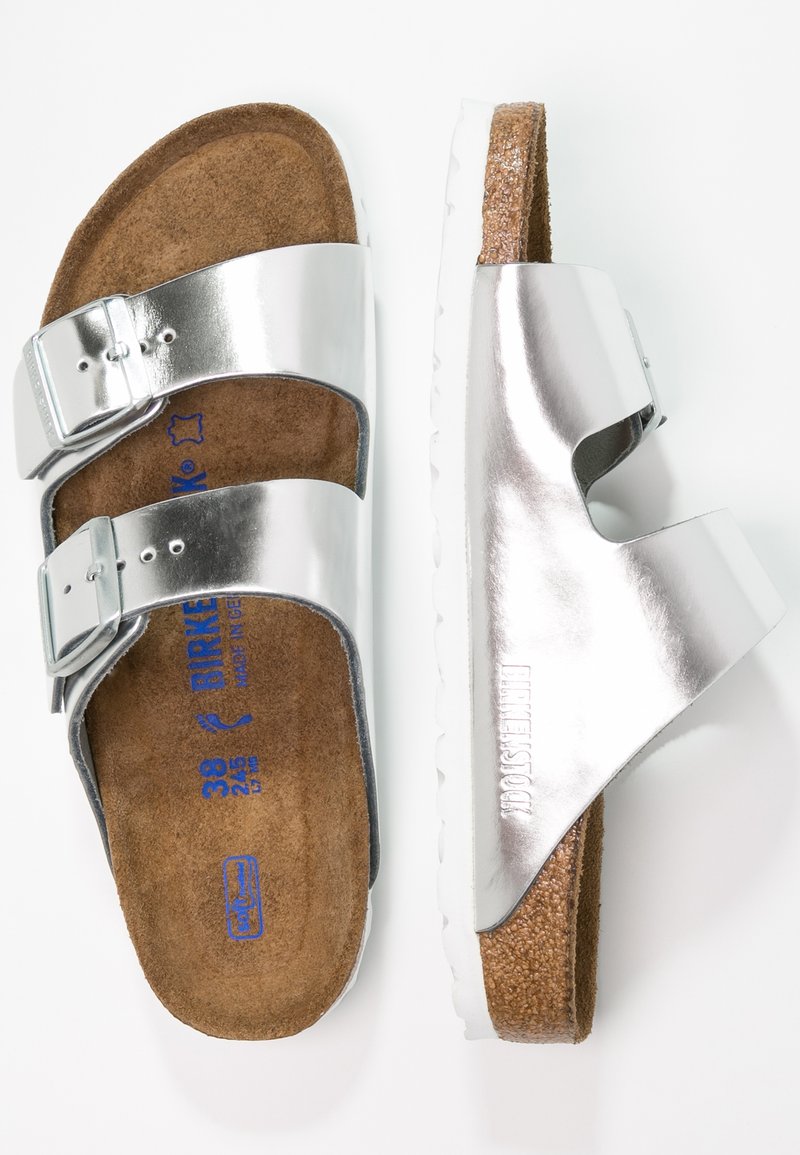 shiny silver birkenstocks