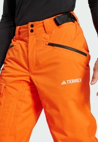 Adidas Terrex XPERIOR TWO-LAYER INSULATED TECH - Skijaške hlače - semi impact orange white