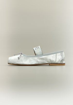 Babies - silver-coloured as art