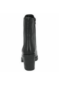 Black leather ankle boot with a round toe, high block heel, and side zipper. Features a textured surface and a branded logo detail on the back.