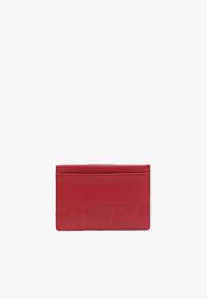 Red leather cardholder with embossed "BIMBA" logo, smooth texture, and three card slots. Compact rectangular shape with stitched edges.