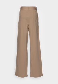 Pantaloni beige a gamba larga con vita alta, texture liscia e senza chiusure visibili. Presentano linee pulite e un design senza decorazioni.