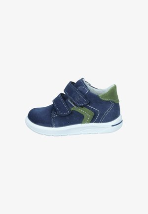 Blue suede sneaker with double Velcro straps, green accents, white rubber sole, and stitched detailing. Rounded toe and padded collar.