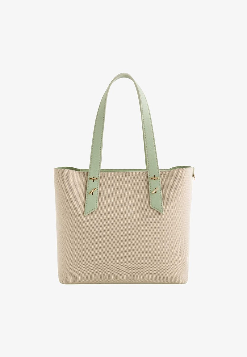 Beige canvas tote bag with light green faux leather handles. Features gold-tone hardware and a structured, rectangular shape.