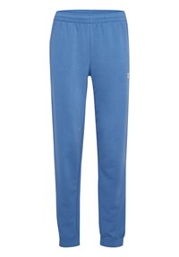 Lyseblå sweatpants med elastisk talje, taljerede ben og et lille hvidt logo på venstre side. Fremstillet af blødt bomuldsblandingsmateriale.