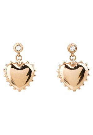 Náušnice ve tvaru srdce se zlatým tónem, s malými kulatými průhlednými kamínky na klipsnách a texturovanými okraji kolem srdcí.