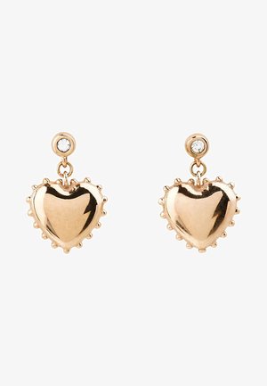 Gold-tone heart-shaped drop earrings with small round clear stones at the studs and textured edges around the hearts.