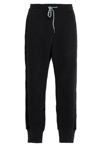 Pantalones de chándal negros hechos de una tela suave, con un cordón con un patrón en azul y blanco, puños ajustados en las piernas y bolsillos laterales.