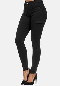Elara Pantalones cargo - schwarz