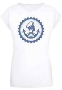 White short-sleeve t-shirt featuring a blue circular graphic of a sailor's profile with an anchor and waves design. Soft, cotton material.