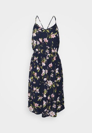 Laivastonsininen hihaton mekko, jossa on ohuet olkaimet, pinkki- ja valkoinen kukkakuosi sekä joustava vyötärö.