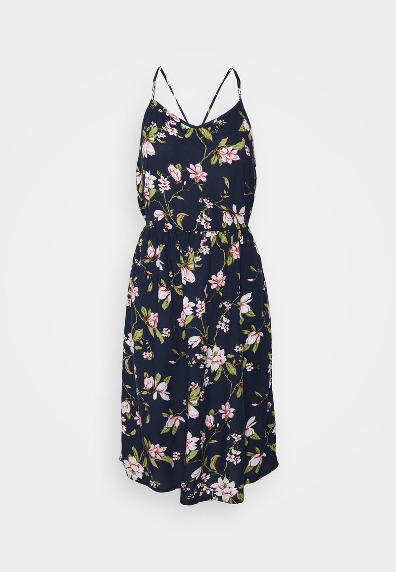 Robe bleu marine sans manches avec bretelles spaghetti, ornée d'un imprimé floral rose et blanc et d'une taille élastique.