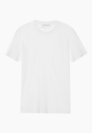 T-shirt blanc à manches courtes en coton, avec un design à col rond et une texture lisse, unie, sans motifs ni accents.