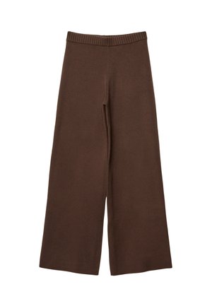 Braune weit geschnittene Hose aus weichem Stoff mit einem gerippten elastischen Bund und ohne sichtbare Verschlüsse oder Taschen.