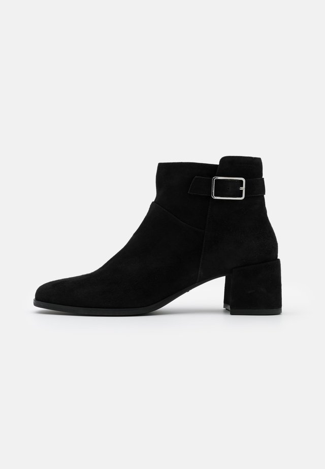 STINA - Ankle boot - black