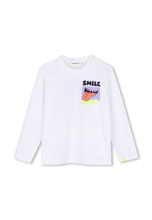 Witte lange mouwen shirt met een kleurrijke afbeelding van een open mond, tong uit, en het woord "SMILE" op de borst.