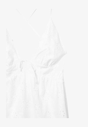 Robe blanche brodée avec un décolleté en V profond, des motifs floraux, un lien à la taille et des bretelles croisées dans le dos.