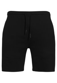 Shorts noirs en tissu doux, avec une taille élastique et un cordon de serrage, des coutures plates et une coupe ajustée.
