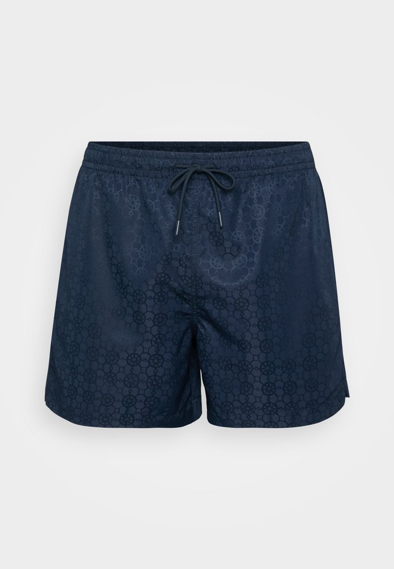 Marineblauwe zwembroek met een tonale geometrische print, een elastische tailleband met trekkoord en een relaxte pasvorm. Soepele textuur.