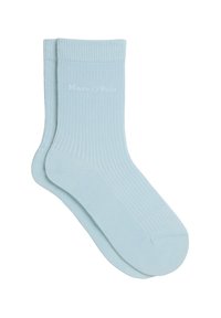 Calzini azzurri a coste con una texture liscia. Presentano un logo sottile sul lato. Design alla caviglia adatto per un look casual.