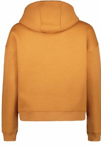 Huvtröja i orange-brun, mjukt bomullsmaterial, kortad design, med långa ärmar och en avslappnad passform. Inga synliga mönster eller detaljer.