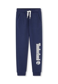 Navyblauwe joggers van zacht materiaal, met zijzakken, een elastische tailleband met trekkoord en witte "Timberland" tekst en logo detail.