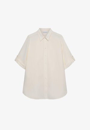 Chemise crème à manches courtes avec boutons, col pointu et manches avec pattes de réglage, présentée sur fond blanc.