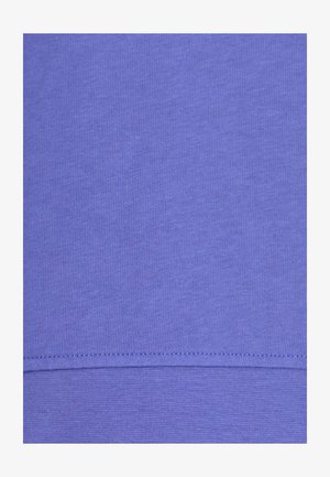 Purple cotton fabric featuring a smooth texture and a simple, even weave with a horizontal seam detail at the bottom.