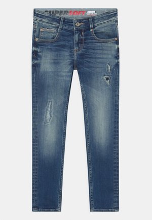 Jeans in denim blu con vestibilità slim, aree scolorite e consumate su cosce, tasche anteriori e chiusura con bottone in vita.