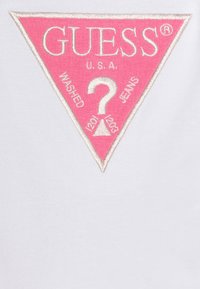 Guess BABY BODY PANTS UNISEX SET - Melegítő - caramel rose