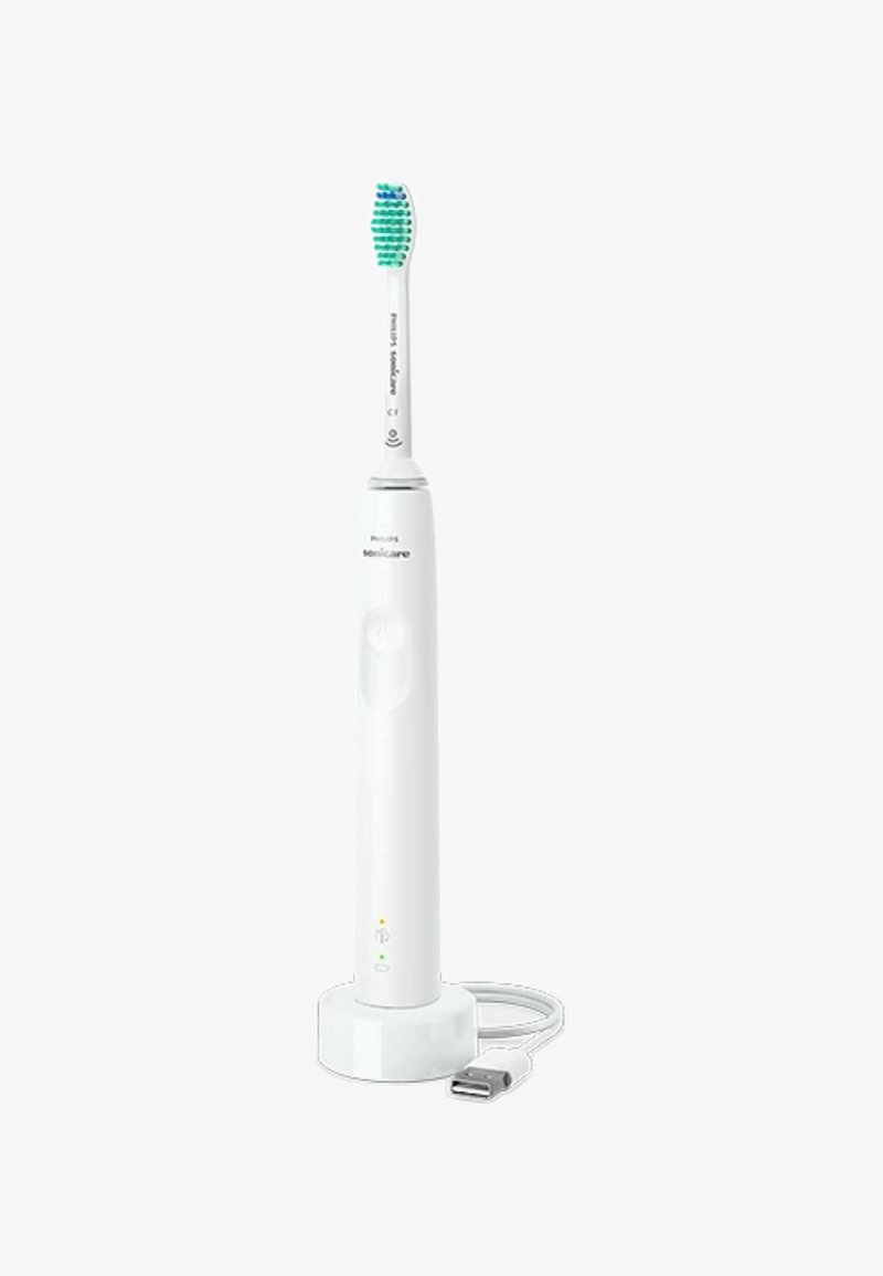 Philips Sonicare electric toothbrush in white plastic, with a green and blue bristle head, charging base, and USB cable. Simple design, compact shape.