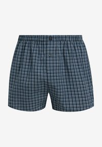 Boxershort met een marineblauw en lichtblauw geruit patroon, elastische tailleband, knoopsluiting en een comfortabele pasvorm. Van katoen.