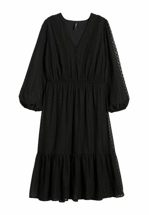 Zwarte jurk met lange pofmouwen, V-hals, textielstructuur, ingezamelde taille en gerimpelde zoom. Voorzien van knoopdetails aan de voorkant.