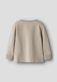 Beige langeklanten shirt met een ronde halslijn en geribde manchetten, gemaakt van zachte stof, met een eenvoudig, onopgesmukt ontwerp.