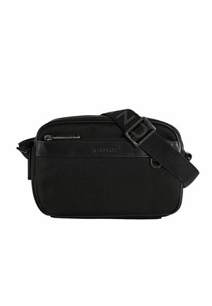 Sac bandoulière rectangulaire noir texturé avec sangle réglable, poche zippée à l'avant et nom de la marque "CHABRAND" sur le panneau avant.