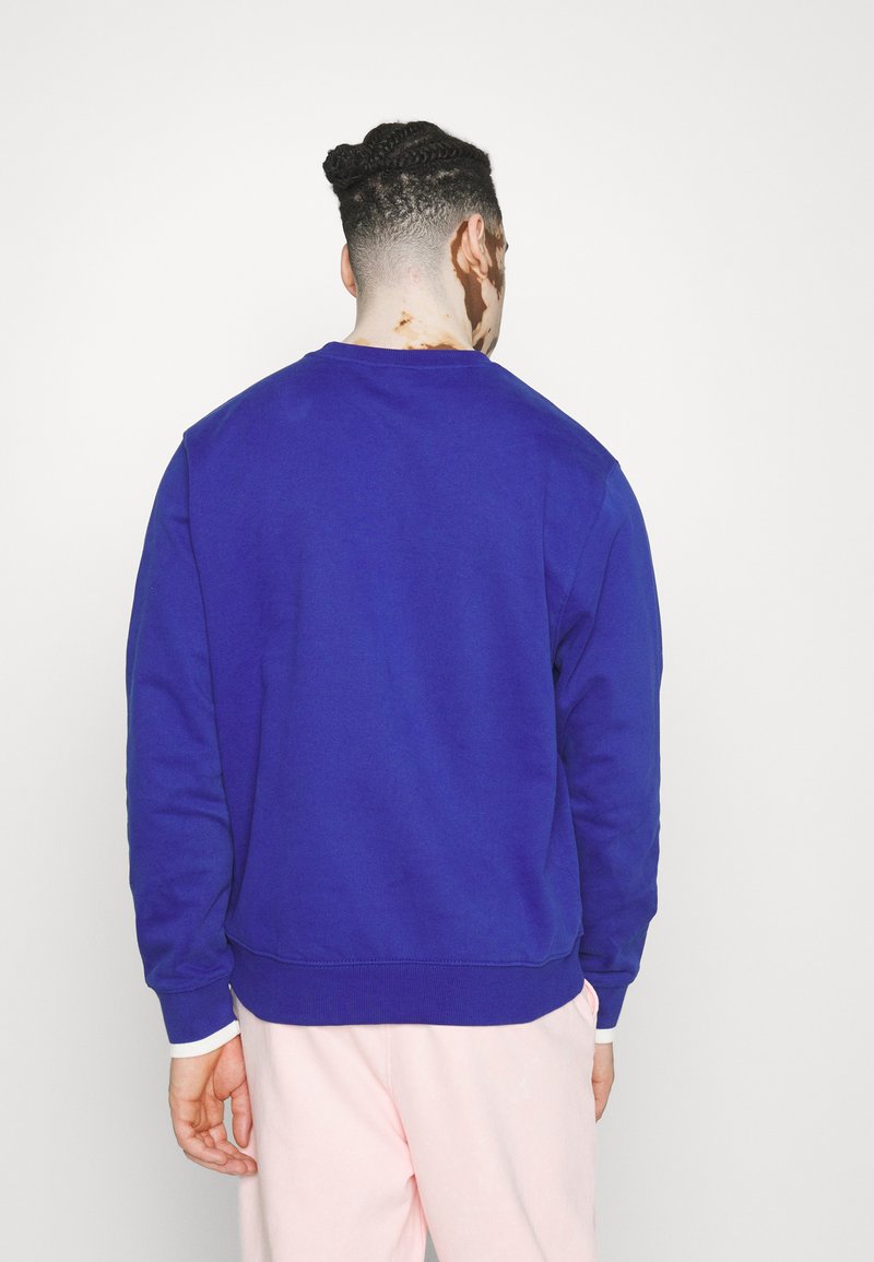 blue crewneck
