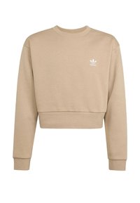 Krátka béžová mikina z mäkkej tkaniny, s dlhými rukávmi, okrúhlym výstrihom a malým bielym logom Adidas na hrudi.