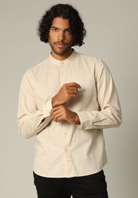 Niet geselecteerd, helles beige