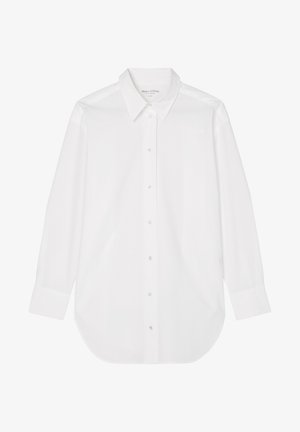 Chemise blanche à manches longues avec boutons, col pointu et poignets, tissu lisse et ourlet légèrement arrondi.