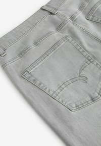Next AUTHENTIC - Kitsenevad teksad - pale grey