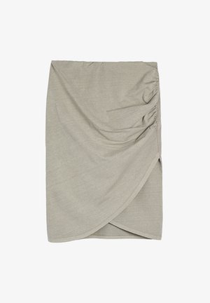 Khaki, lightweight cotton skirt with ruched side detail and a subtle draped wrap design. Features a straight silhouette and elastic hem.