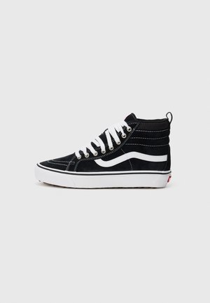 Black high-top sneaker with white laces, white side stripe, and white rubber sole against plain light background.
