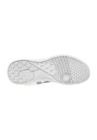 Witte sport shoe zool met een gestructureerd oppervlak, voorzien van hexagonale en lineaire patronen, en "Kempa" branding aan de zijkant.