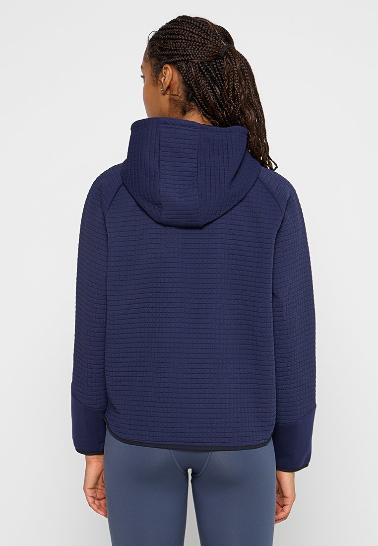 Sudadera con textura en azul marino, con una gran capucha, que presenta tejido acanalado, un corte holgado y puños en contraste. Apta para ropa activa.