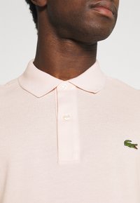 Lacoste Polo - nidus