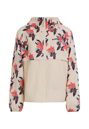 Beżowa kurtka z kapturem na suwak z różowym i granatowym kwiatowym wzorem na górnej połowie i rękawach, elastycznymi mankietami i przednimi kieszeniami.