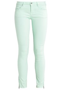 Jean skinny vert menthe en mélange de coton, avec poches avant et arrière, détails zippés aux ourlets et finition lisse.