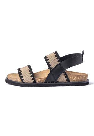Sandaal met open teen met beige en zwarte zigzag-patroon stoffen banden, zwarte leren hielband, kurken voetbed en zwarte rubberen zool.